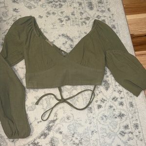 Green A-line top with corset lacing